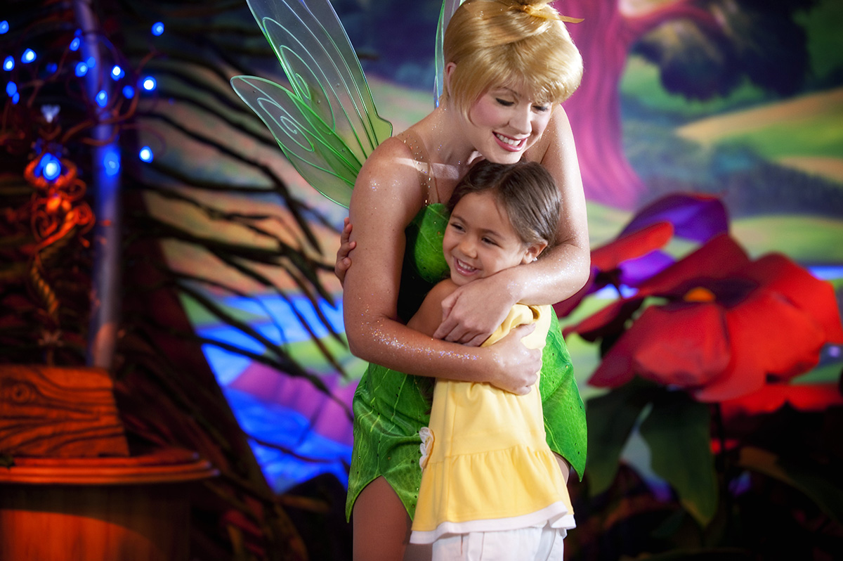 Young Guest Hugging Tinker Bell